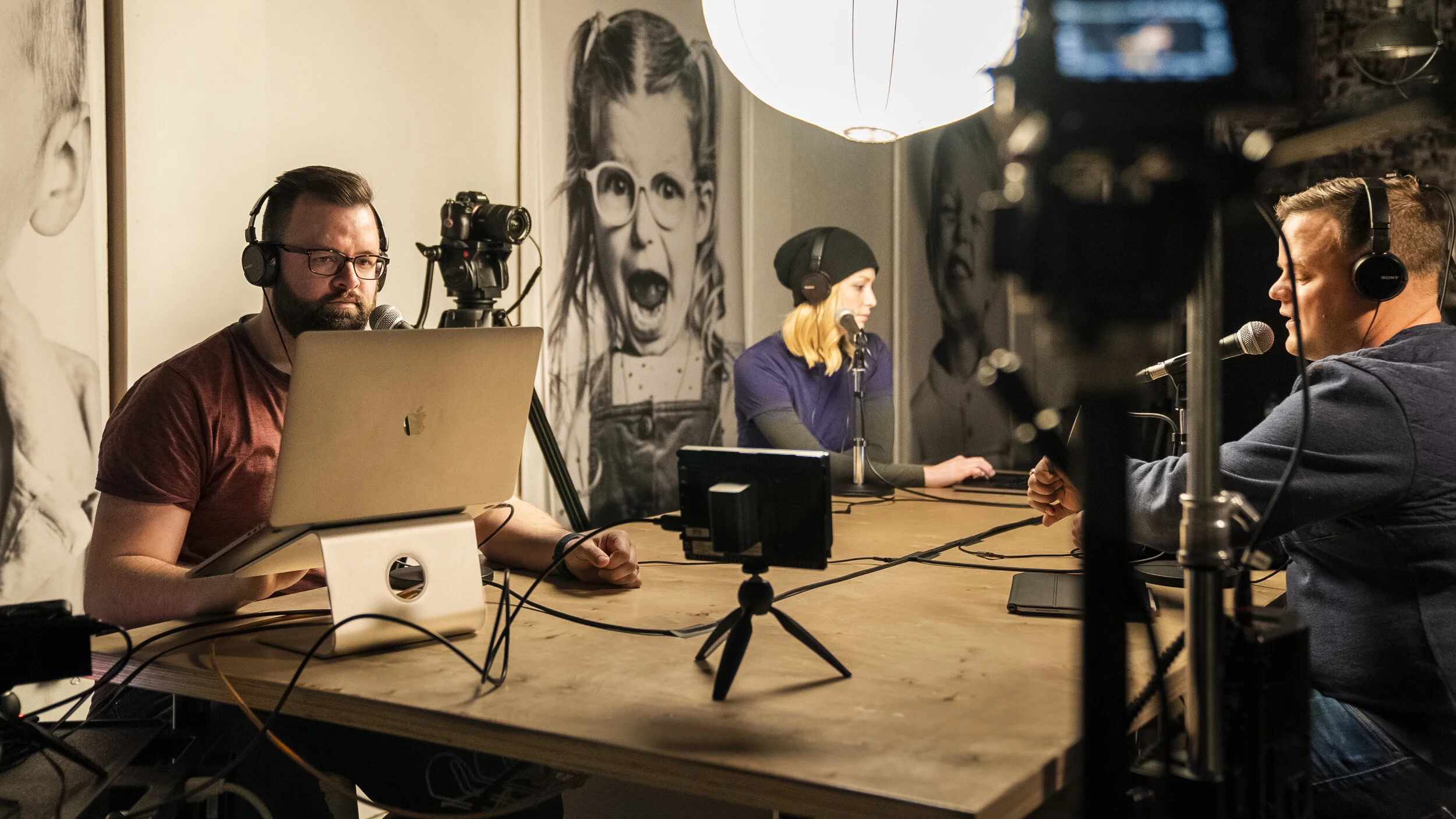 Studio D camera operator covering a live conference session