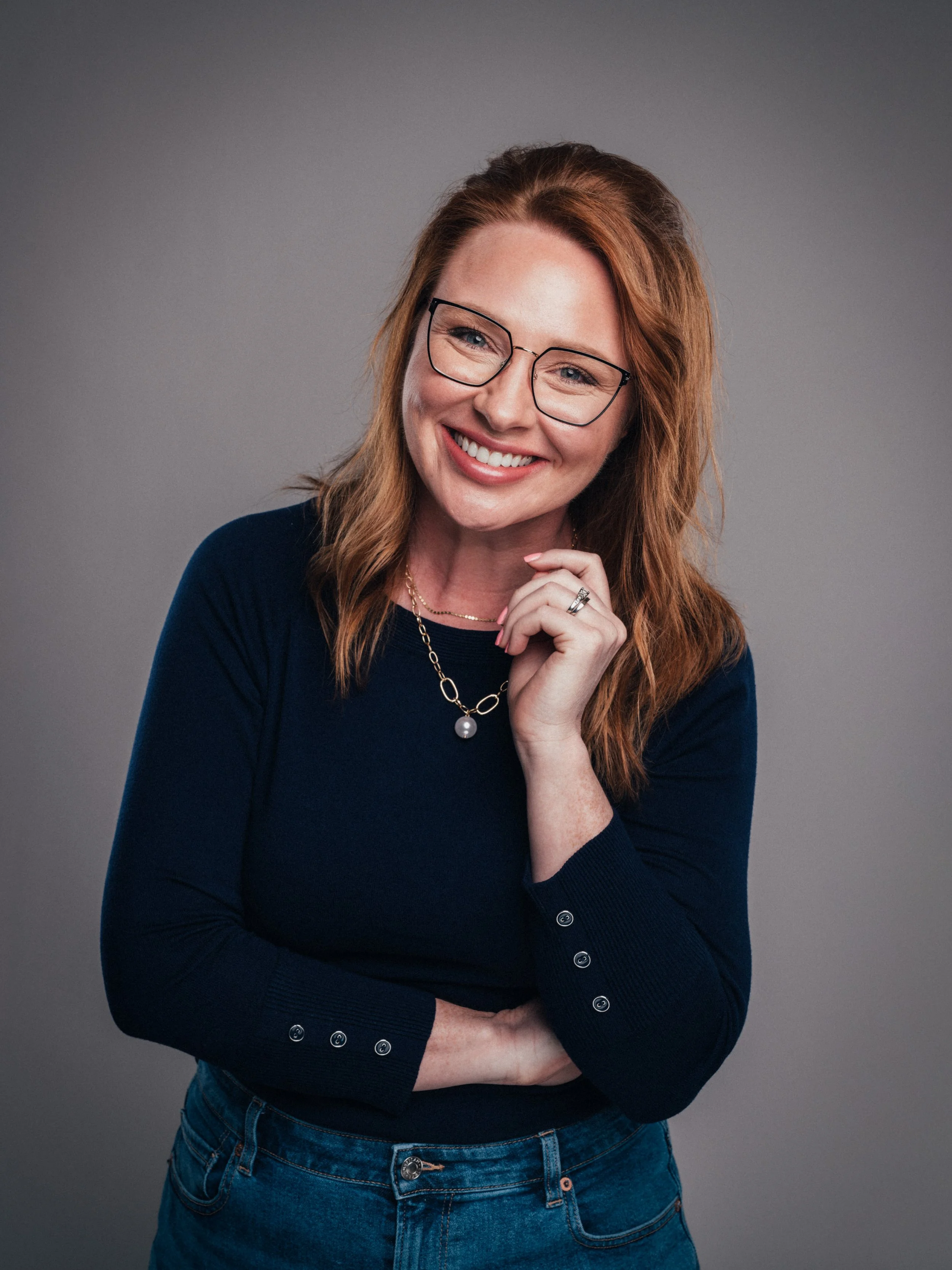 Studio headshot of Katherine Regnier on a clean background