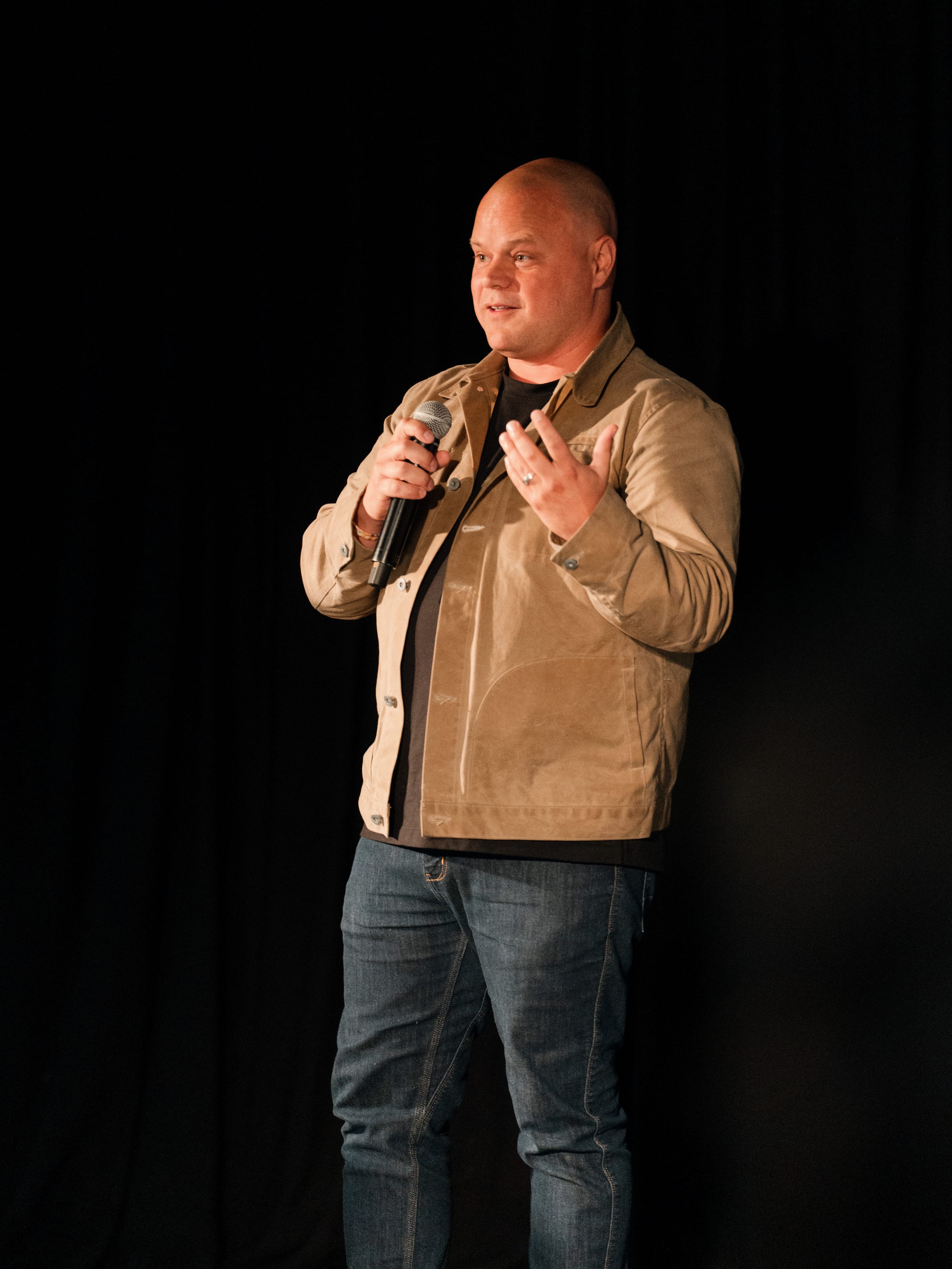 Matt Ramage presenting on stage about authentic brand presence